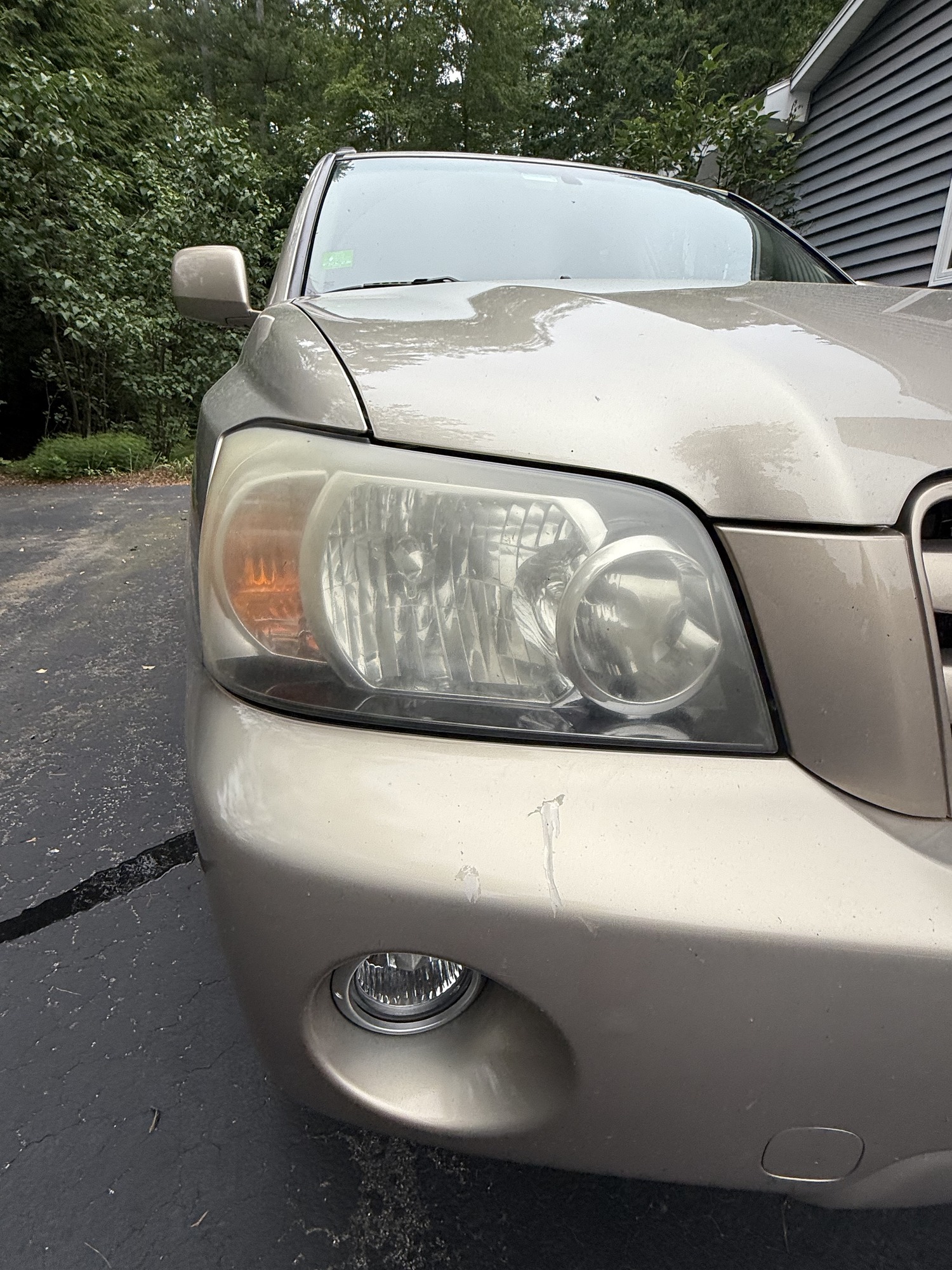 Before headlight restoration Merrimack NH — cloudy oxidized Toyota 4Runner headlight