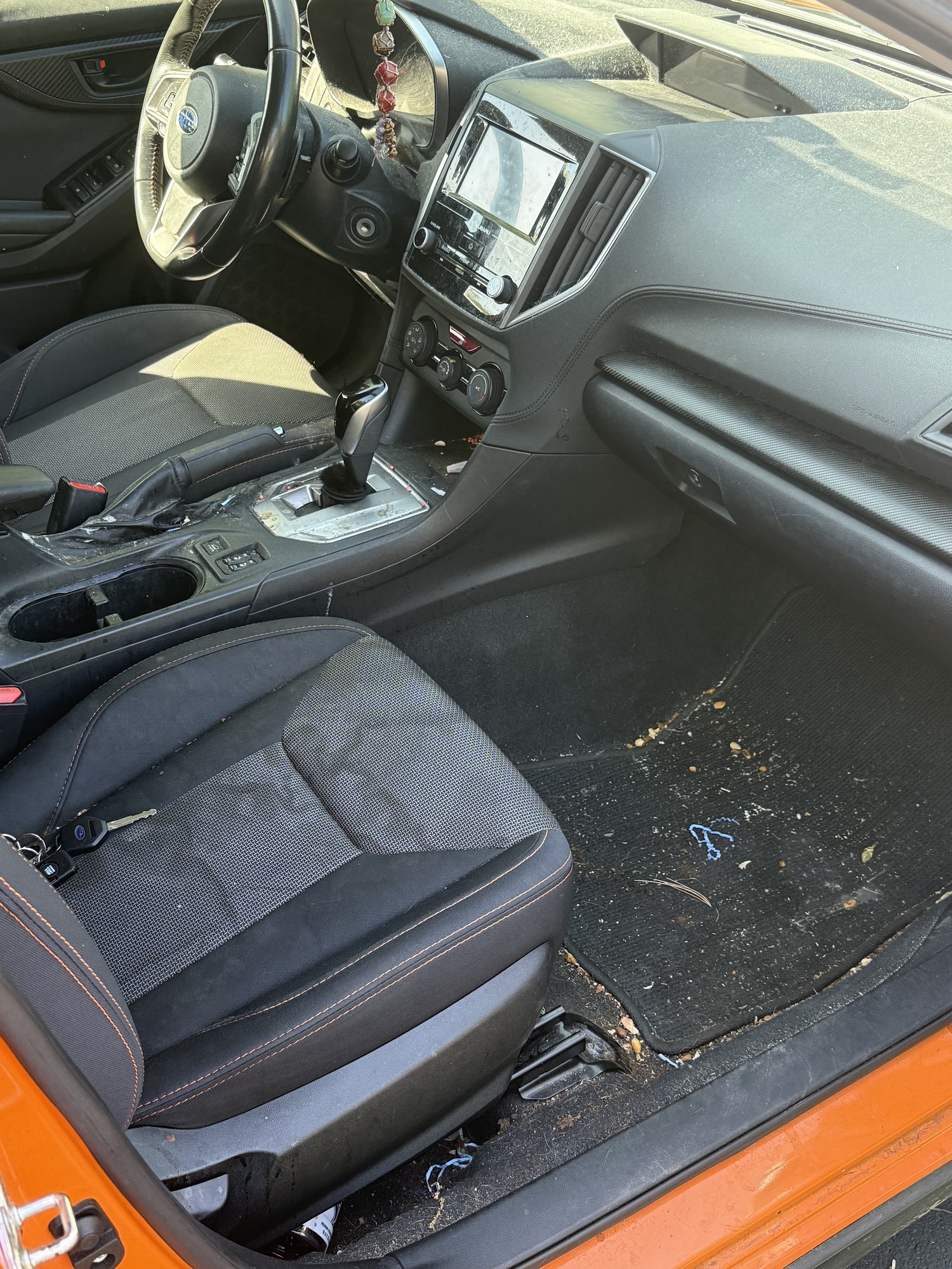 Before interior detailing Merrimack NH — dirty Subaru Crosstrek carpet and seats